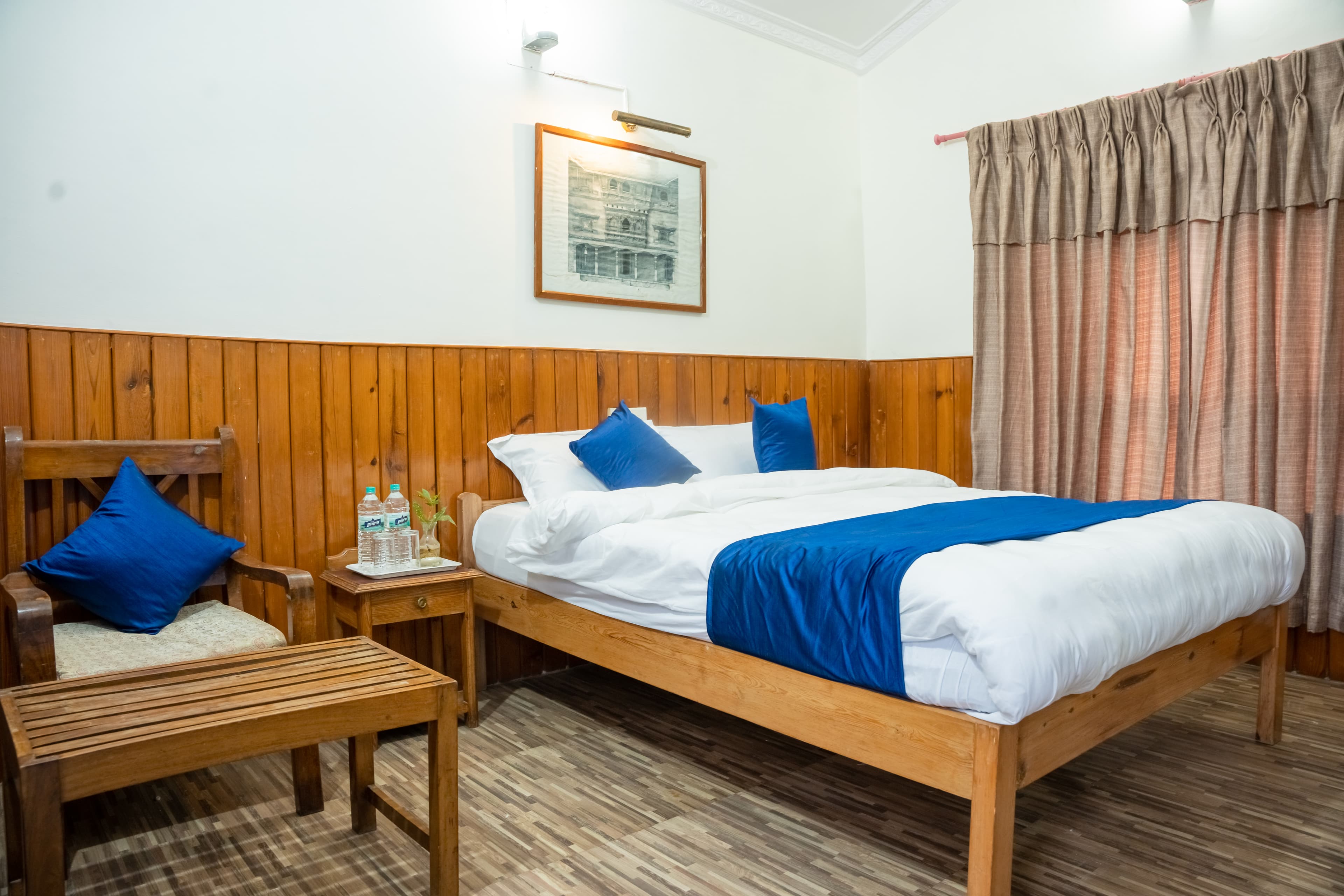 Deluxe Queen bedroom with garden view at Lazy Lads Backpackers Pokhara